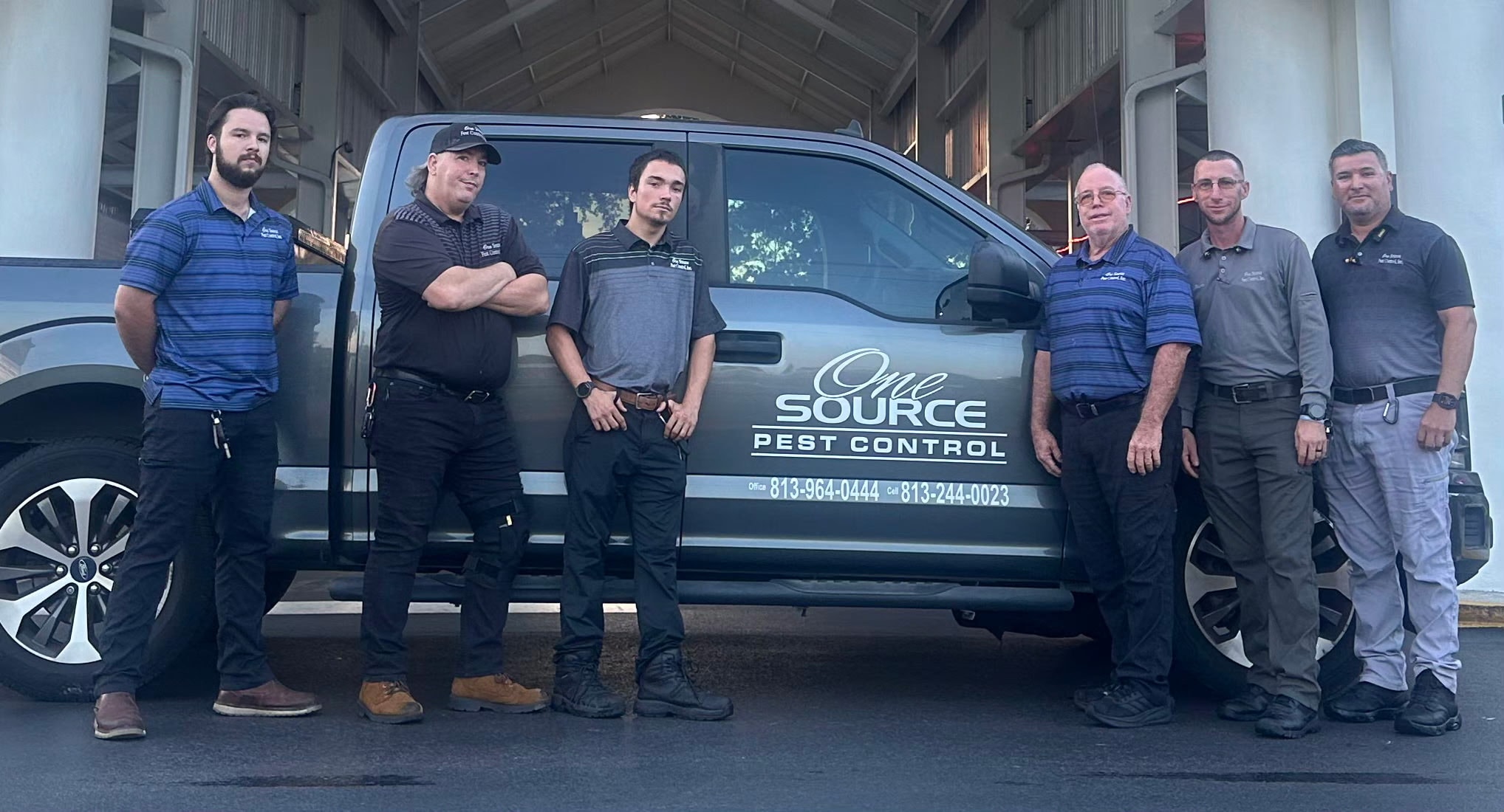 One Source Pest Control team with service van